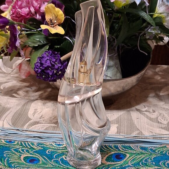 Near empty perfume bottle - Picture 1 of 3